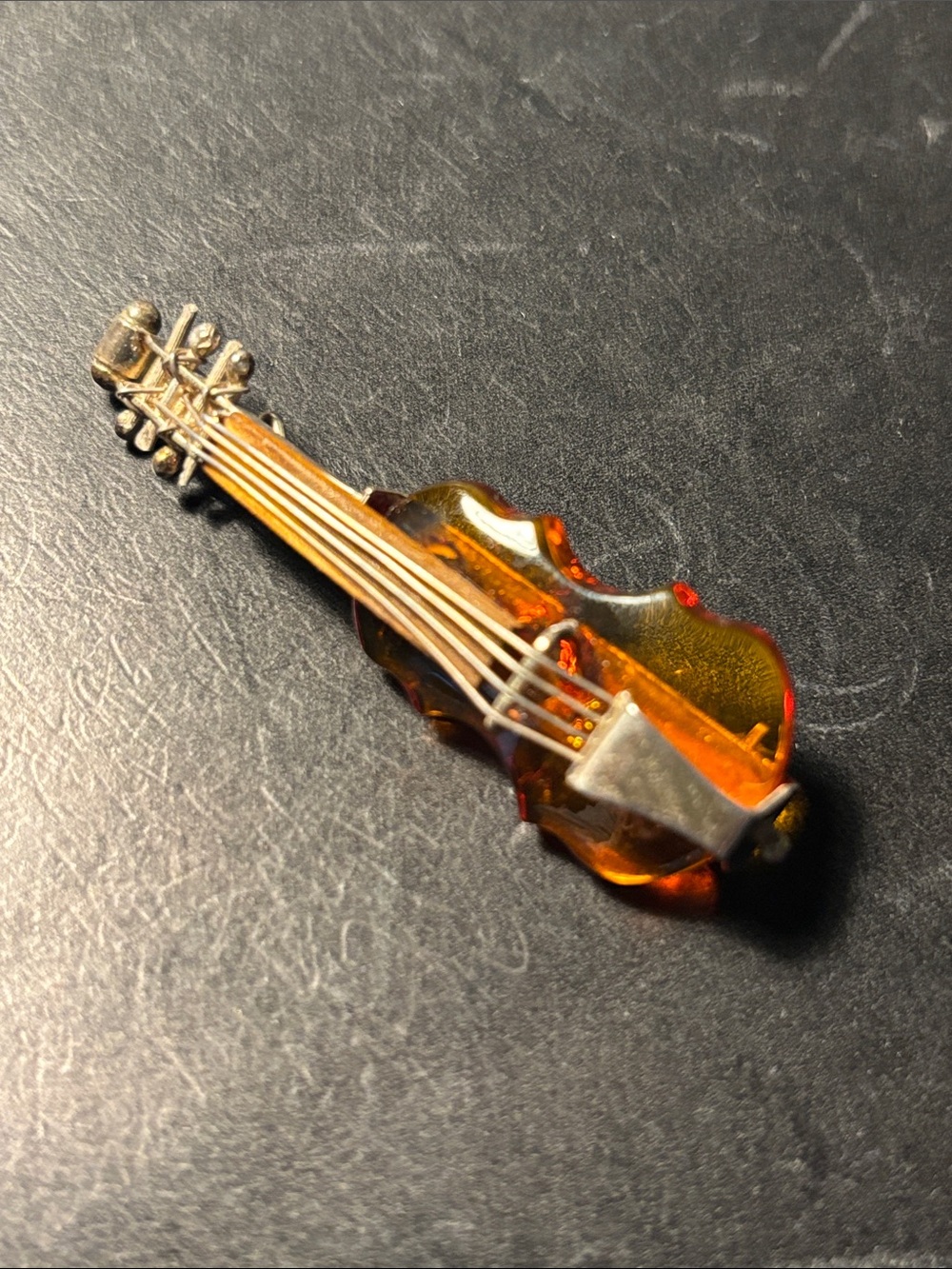 Amber violin brooch/pin